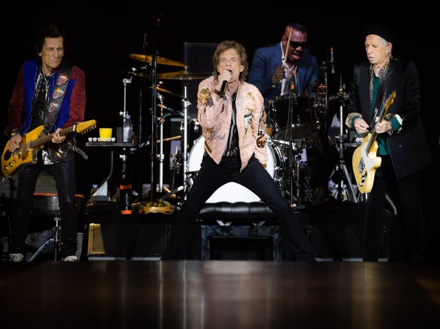 <p>Ronnie Wood, Mick Jagger, Steve Jordan and Keith Richards of The Rolling Stones perform onstage at SoFi Stadium</p>