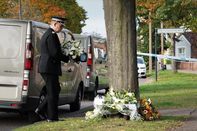 <p>The chief constable of Essex Police lays flowers in tribute to Conservative MP Sir David Amess outside Belfairs Methodist Church in Leigh-on-Sea</p>