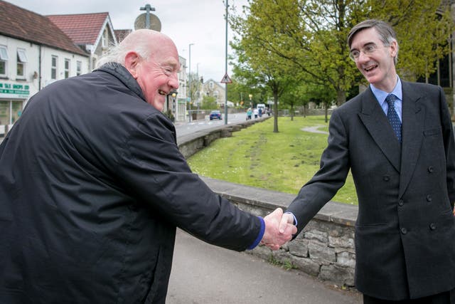 <p>Meeting the public: Conservative MP Jacob Rees-Mogg stops to talk to people near his constituency office in Keynsham, Somerset </p>