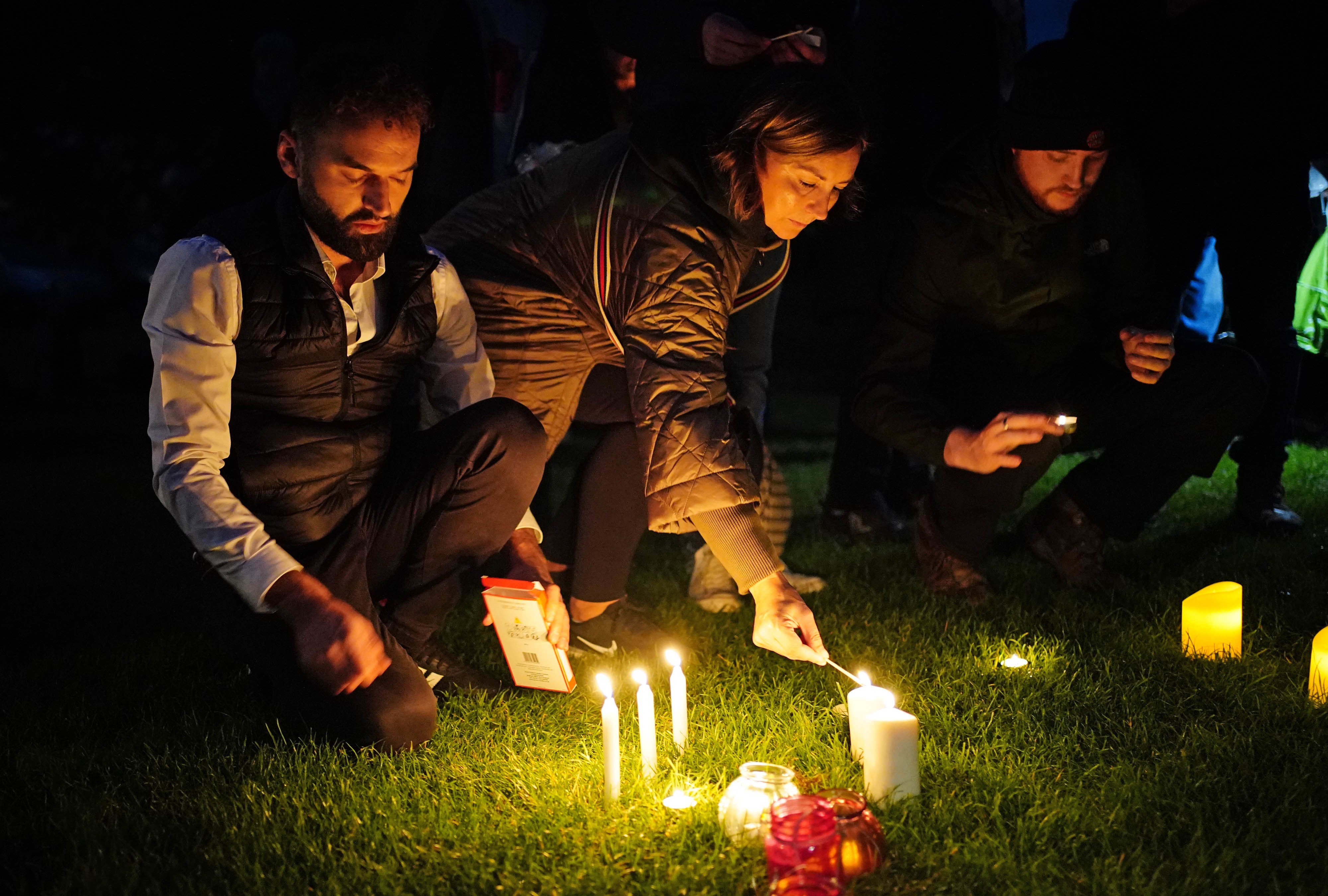 Well-wishers light candles at Belfairs Recreation Ground in Leigh-on-Sea, Southend on Saturday