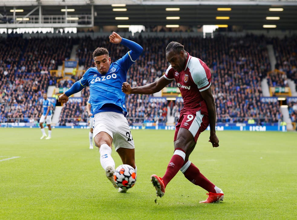 <p>West Ham United's Michail Antonio in action with Everton's Ben Godfrey</p>
