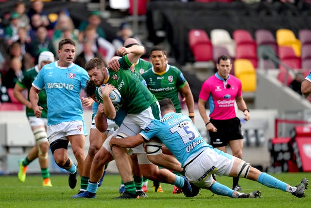 London Irish’s Ben Donnell is tackled by Gloucester’s Matias Alemanno (right) (John Walton/PA)