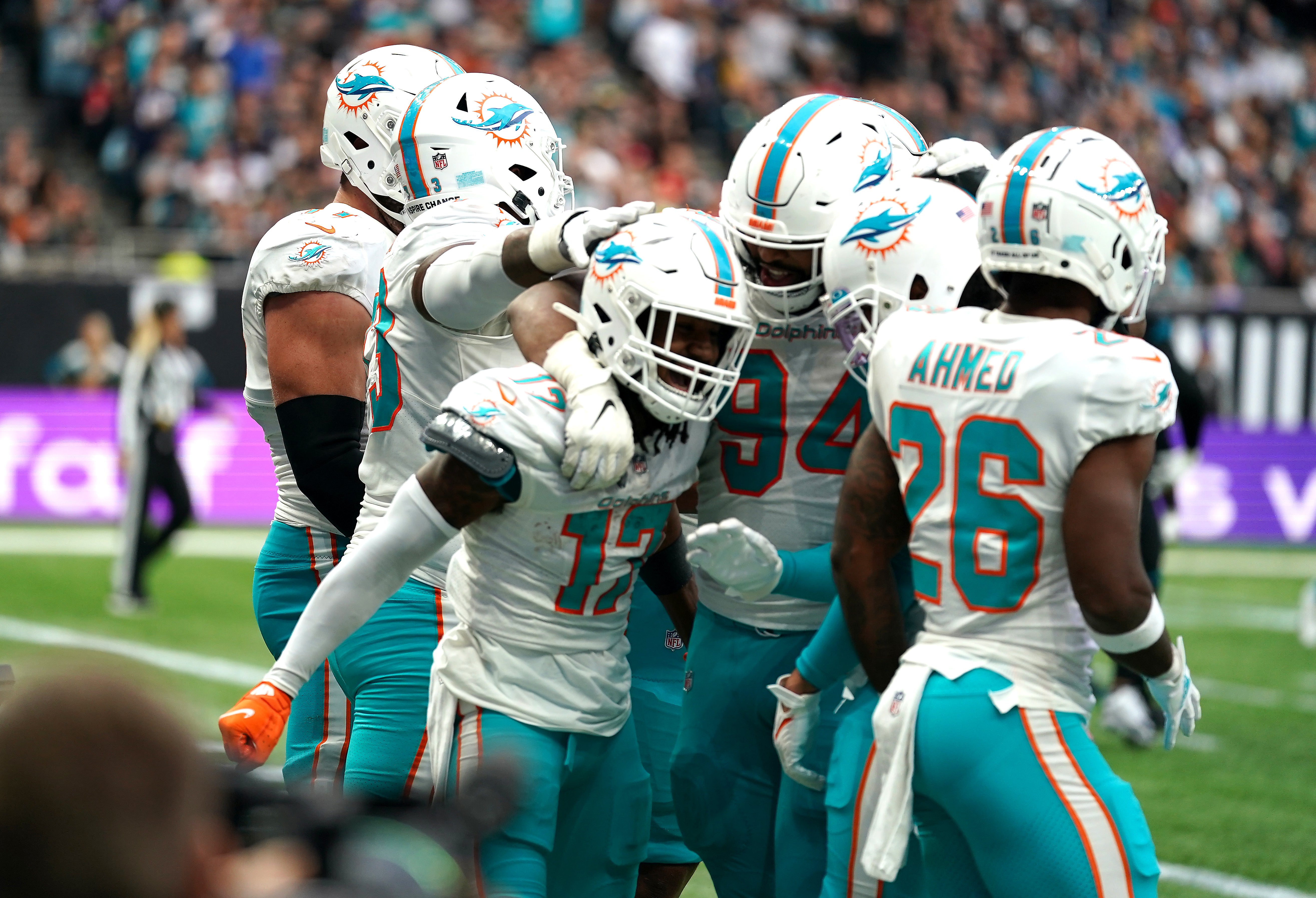 Jaylen Waddle celebrates scoring a touchdown with his Miami Dolphins team-mates (Adam Davy/PA)