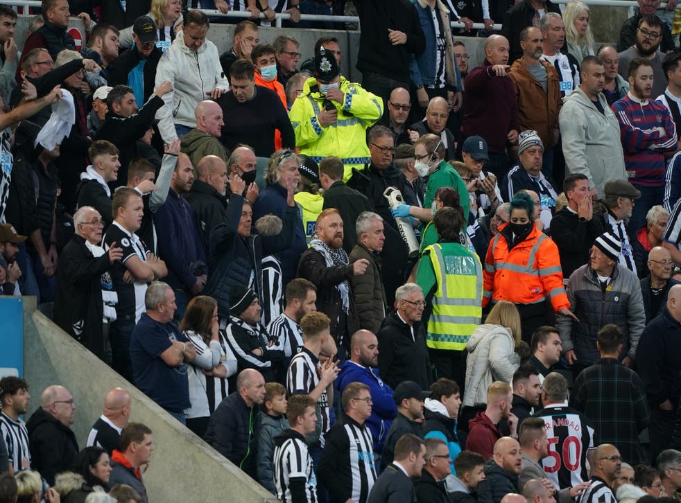 Medical personal were called to assist a fan in the stands during the Premier League match between Newcastle and Tottenham (Owen Humphreys/PA)