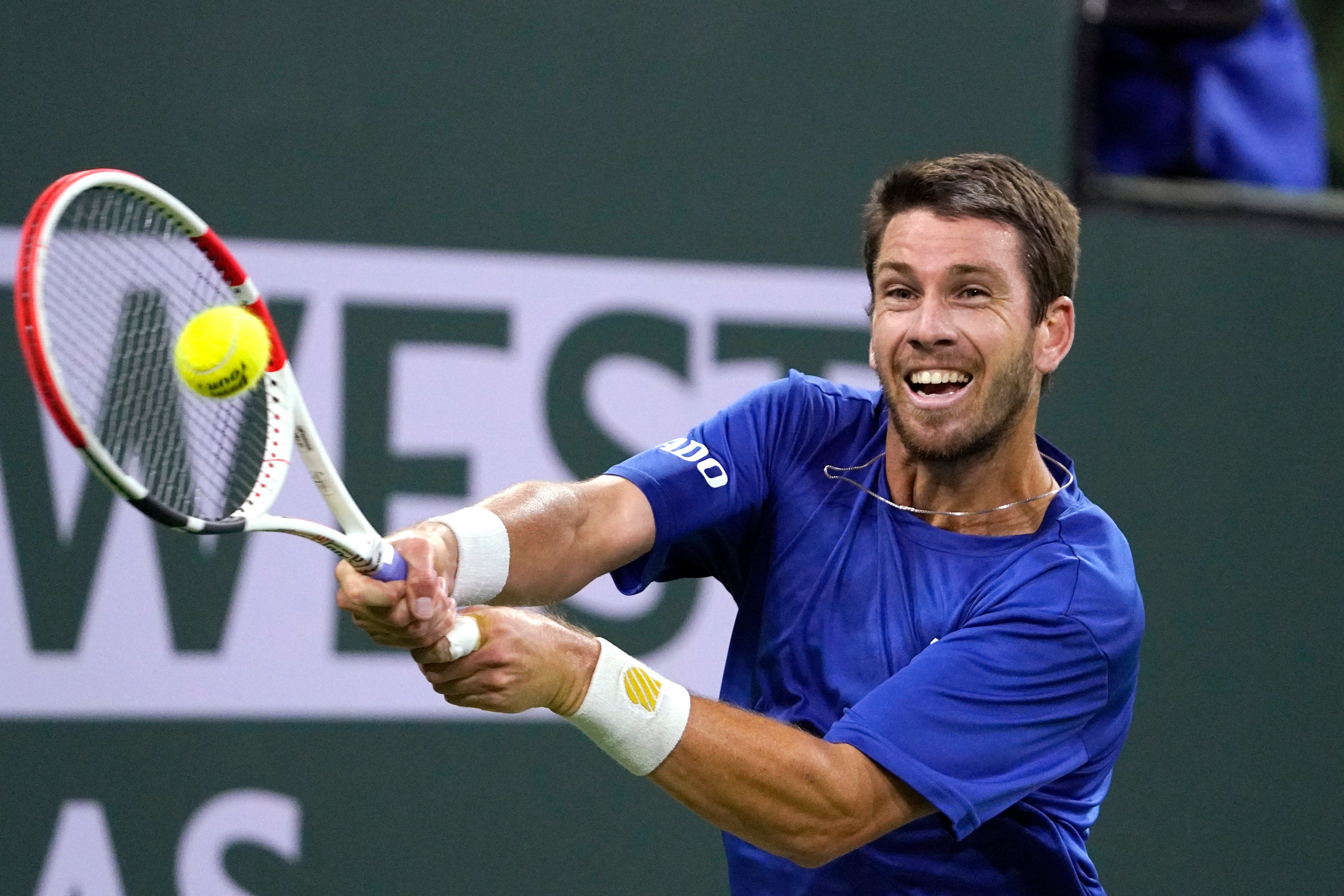 Cameron Norrie returns a backhand (Mark J Terrill/AP)