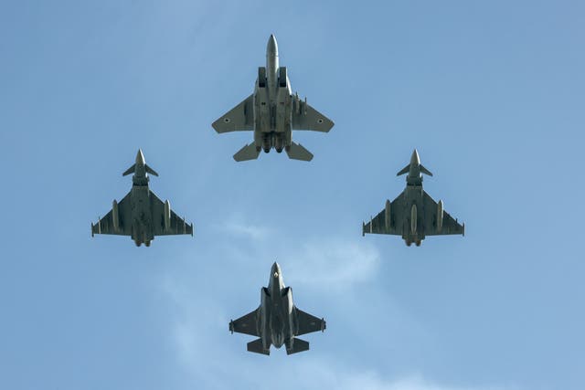 <p>Israel and German (L and R) fighter jets fly over the Knesset, Israel’s parliament, during a flyby in a display of cooperation between the two countries and their armies, in Jerusalem </p>