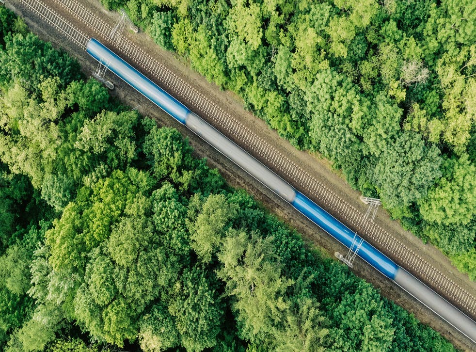 <p>A train cuts through the Czech countryside</p>