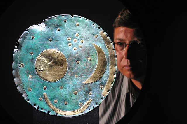 <p>The 3,600 year old Nebra Sky Disc is thought to be the world’s oldest surviving map of the stars</p>