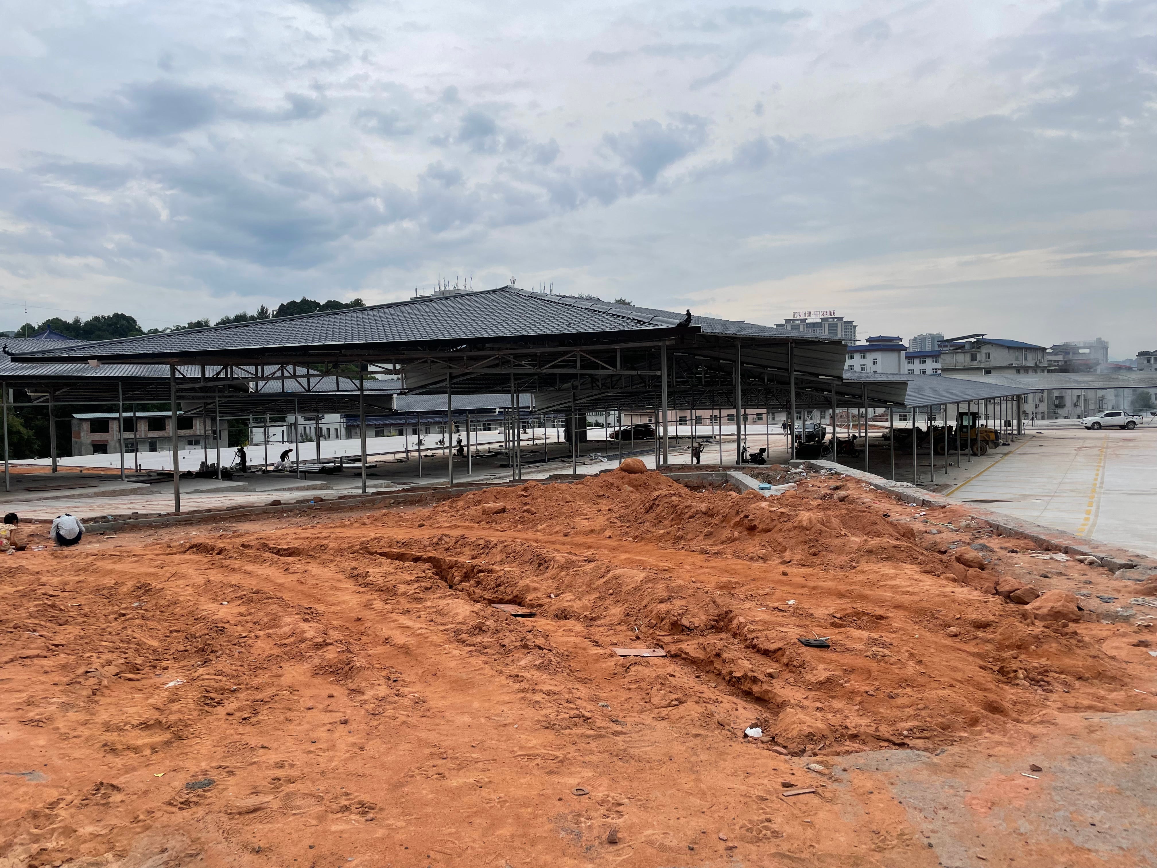 A new community market under construction in Enshi city. At least six were permanently shut down during the first three months of 2020