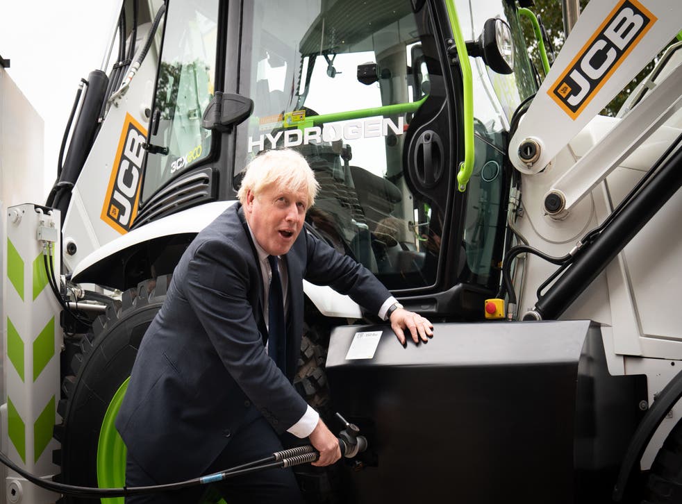 Prime Minister Boris Johnson unveiled a hydrogen-powered JCB telescopic handler, as the construction equipment firm announced it is investing £100m in a project to produce super-efficient hydrogen engines (Stefan Rousseau/PA)