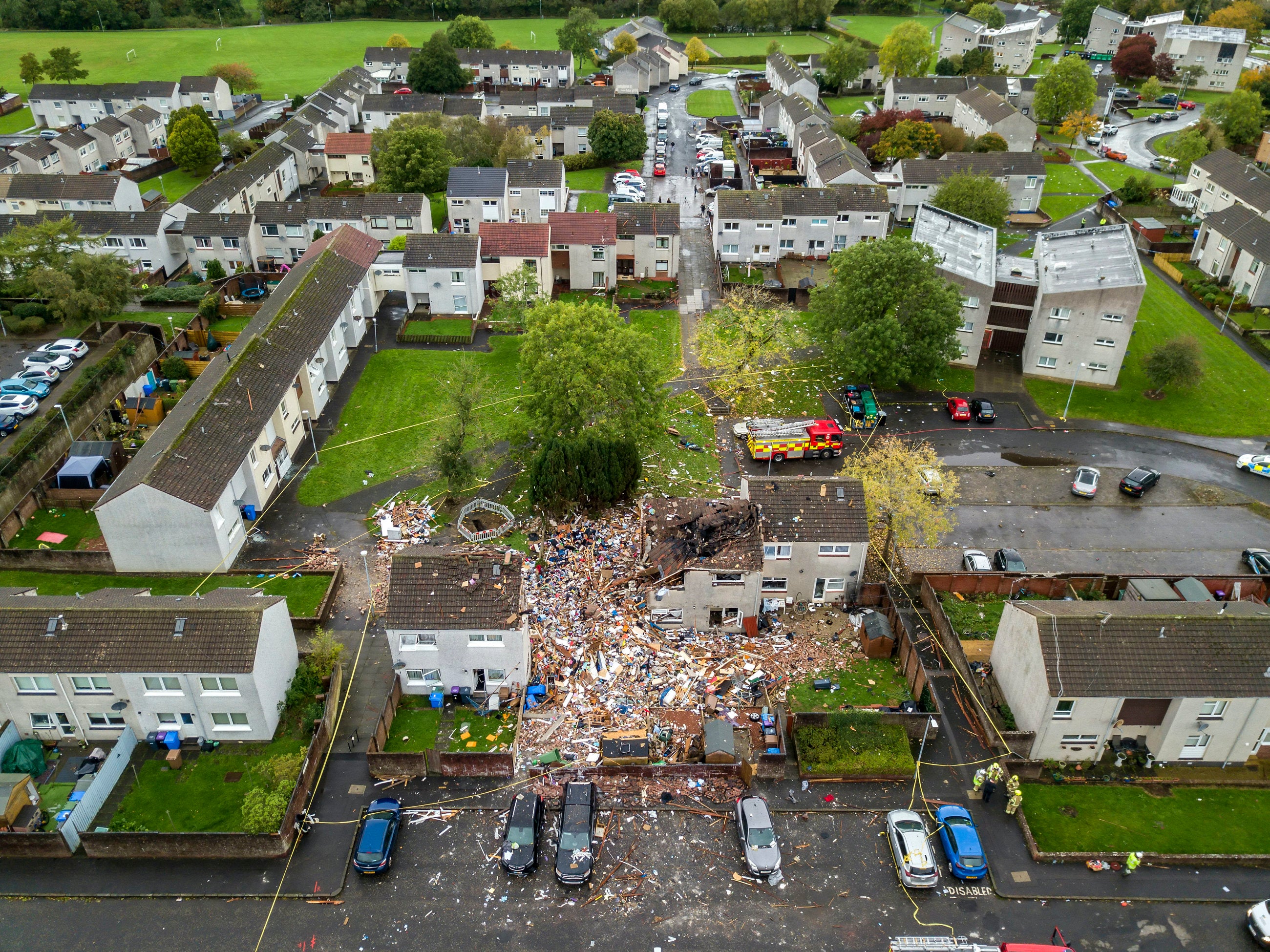 The scene of the blast in Ayr shows a house raised to the ground after a suspected gas explosion