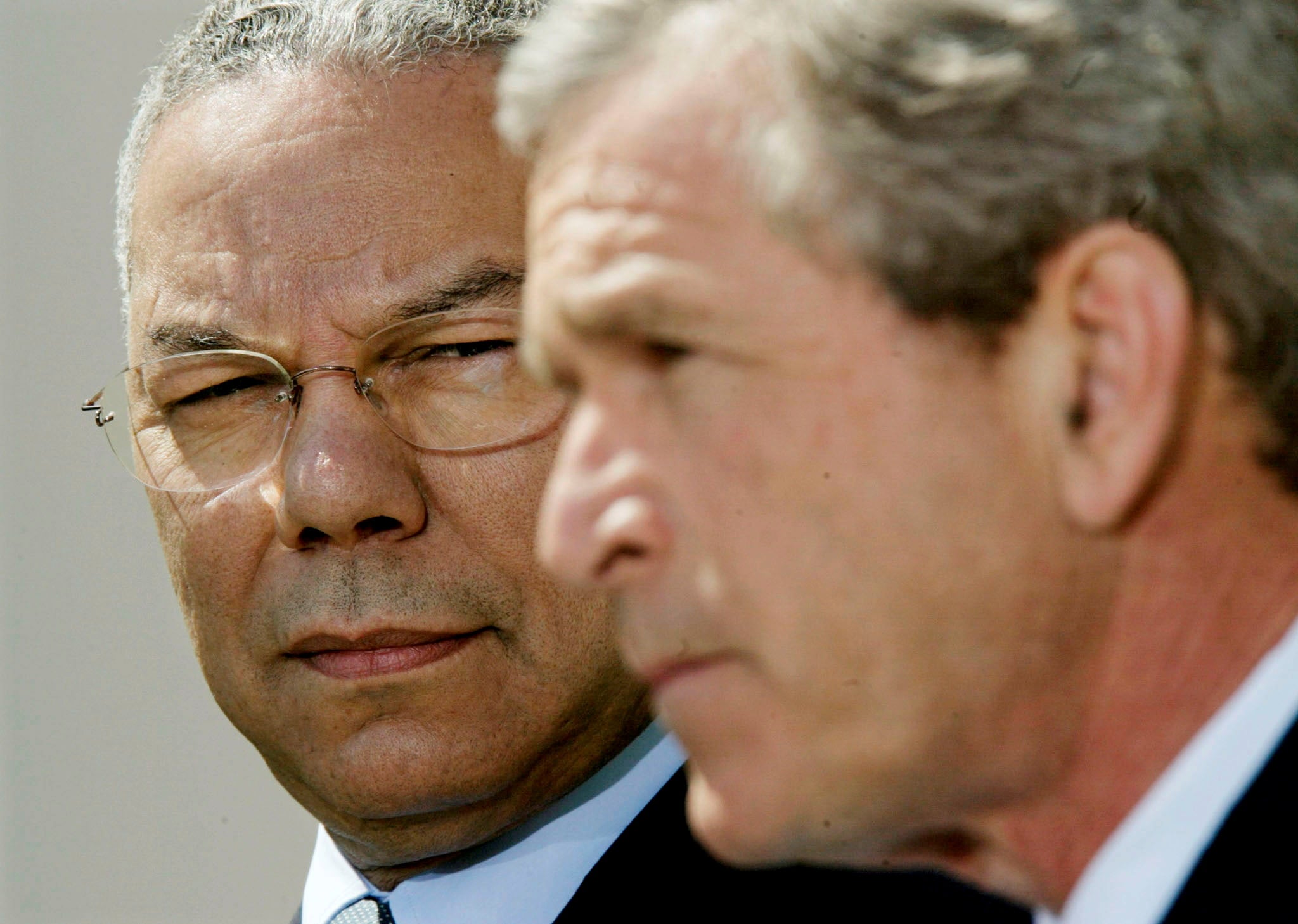 Colin Powell and George W. Bush