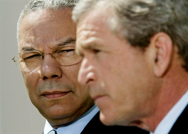 <p>Colin Powell and George W. Bush</p>