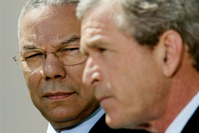 <p>Colin Powell and George W. Bush</p>