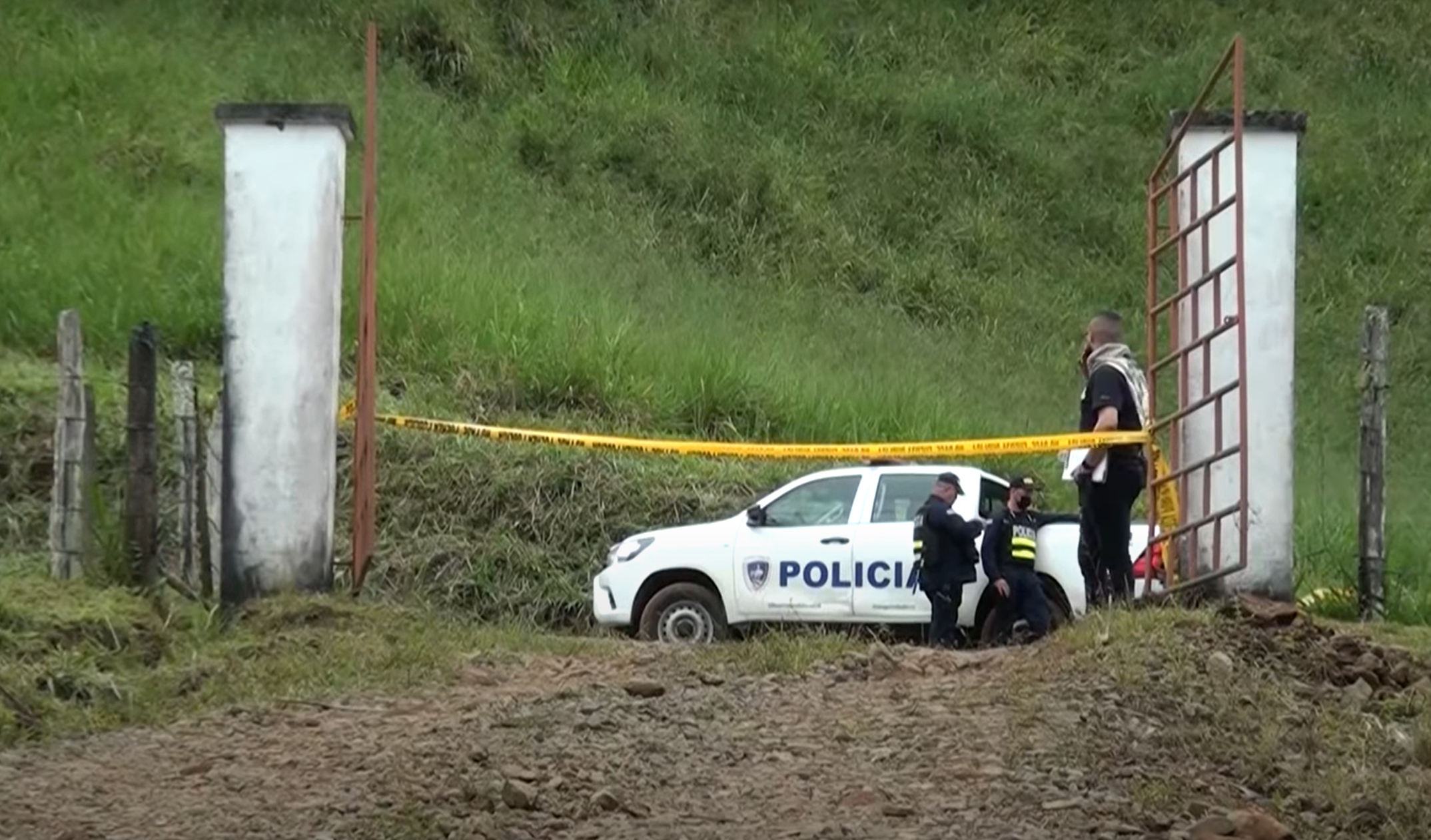 Police investigate the crime scene at the Costa Rica farm of Stephen Sandusky