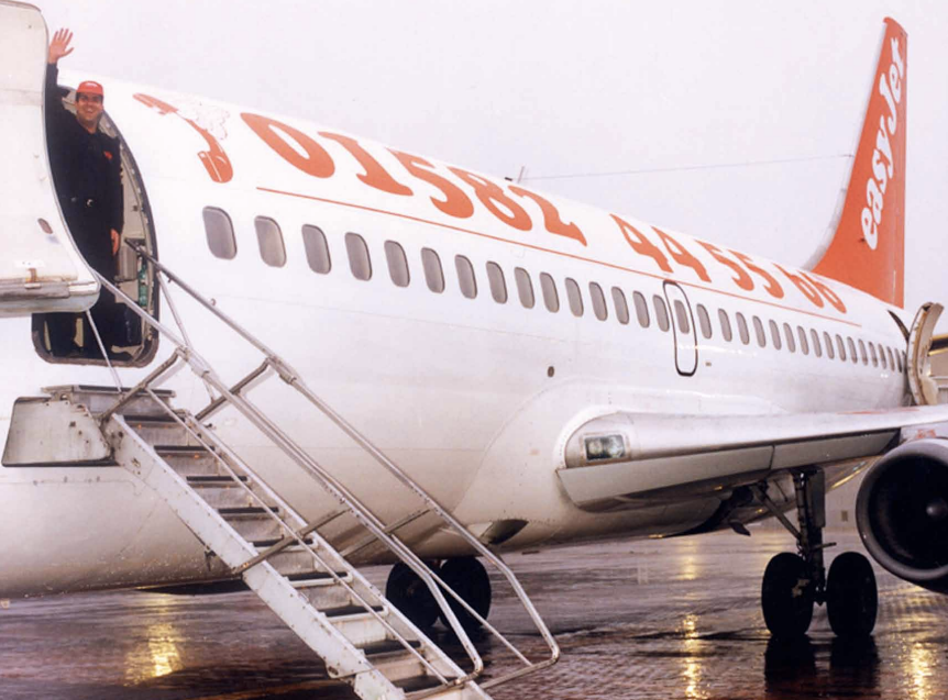 First mover: Stelios Haji-Ioannou and the maiden flight of easyJet from Luton to Glasgow in November 1995. Air Passenger Duty came in the previous year.