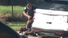 Deputy filmed slamming woman so hard he ripped her braids out