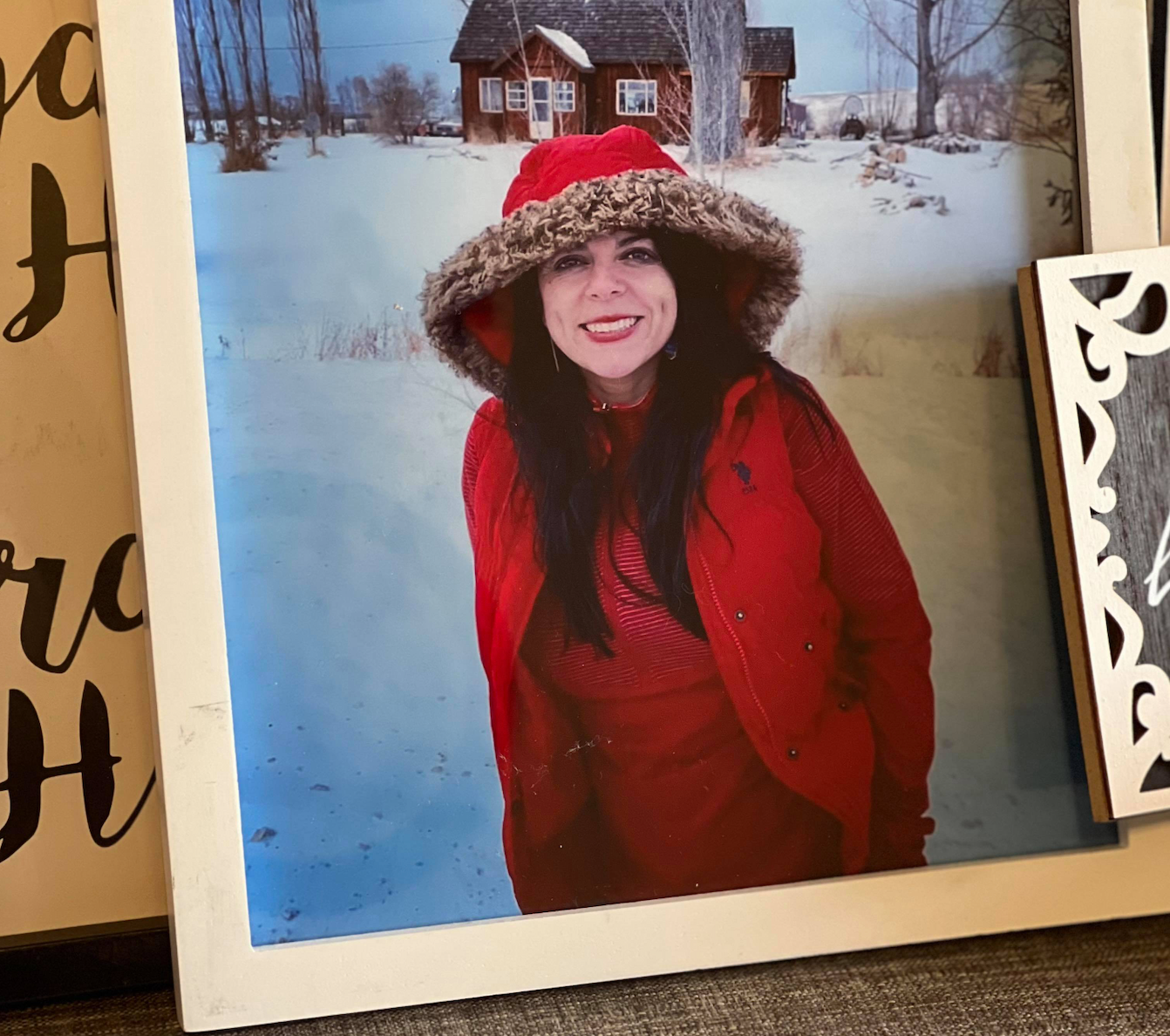 A picture of Gaby Ramos rests on a makeshift memorial inside her Taylorsville, Utah, home.