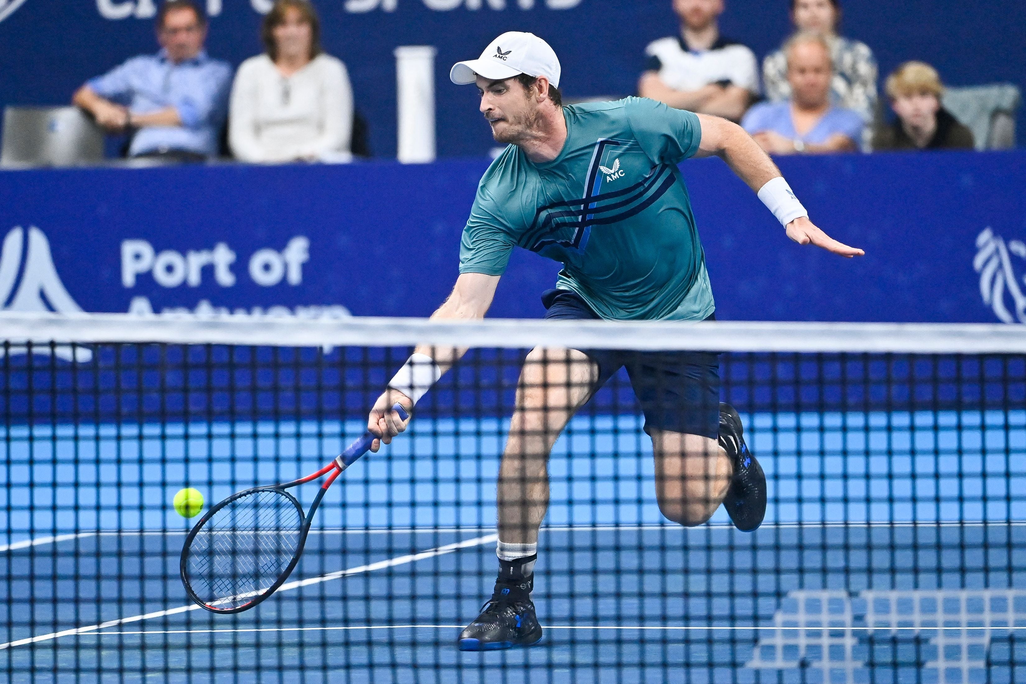 Andy Murray gets to a ball against Frances Tiafoe