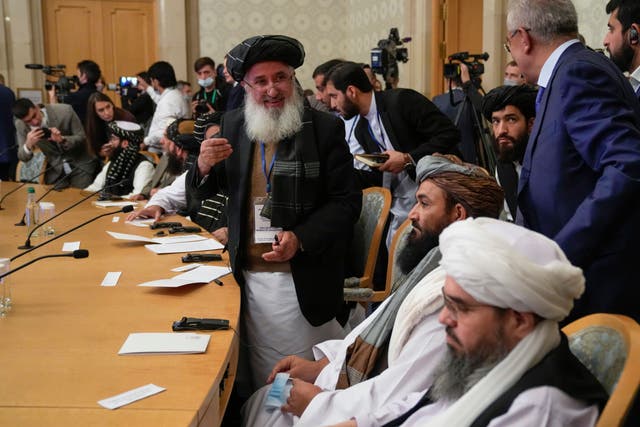 <p>Members of a political delegation from the Taliban attend talks involving Afghan representatives in Moscow on 20 October</p>