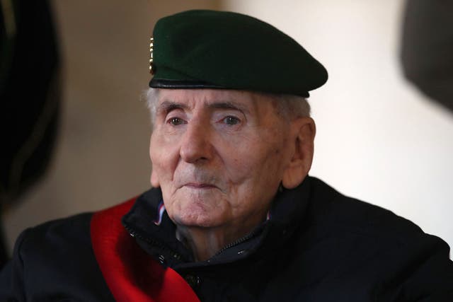 <p>Germain attends a funeral ceremony for French resistance fighter Daniel Cordier at the Hotel des Invalides in Paris in November last year </p>