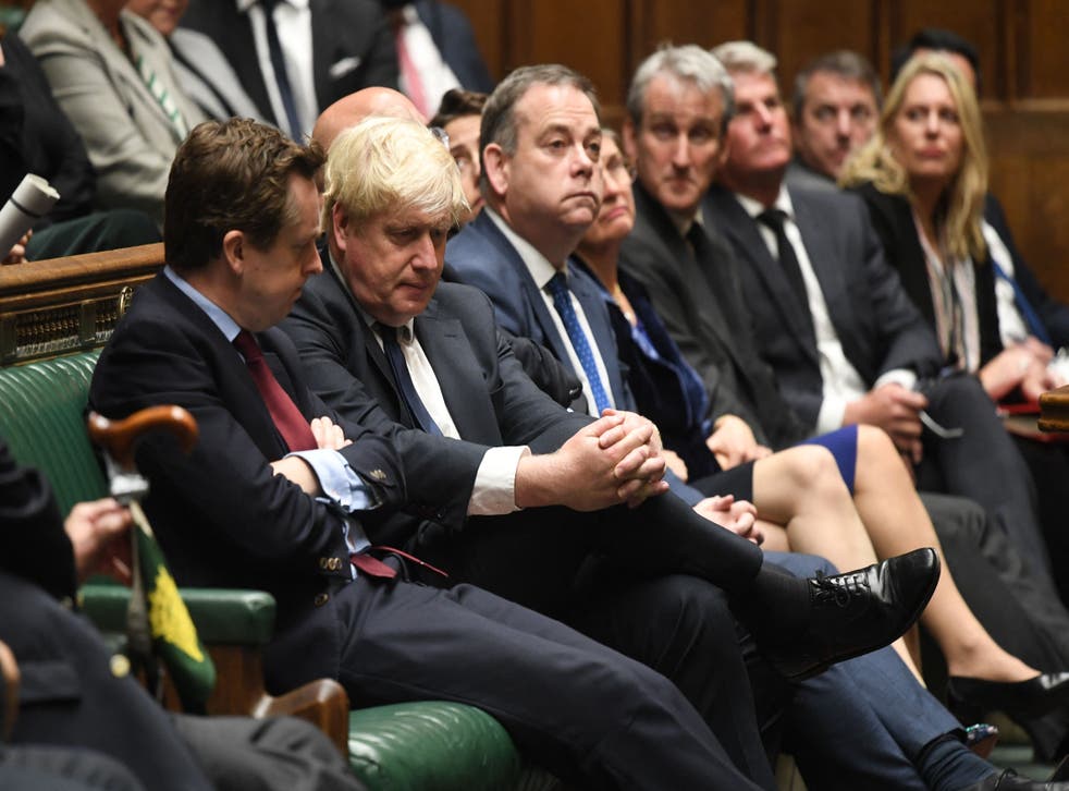 <p>Unmasked Cabinet ministers surrounded Boris Johnson in the Commons for Prime Minister’s Questions</p>