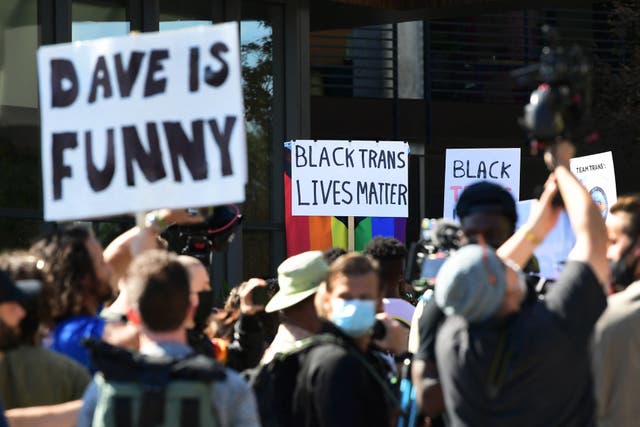 <p>People rally in support of the Netflix transgender walkout and others in support of comedy and free speech, on October 20, 2021 in Los Angeles, California</p>