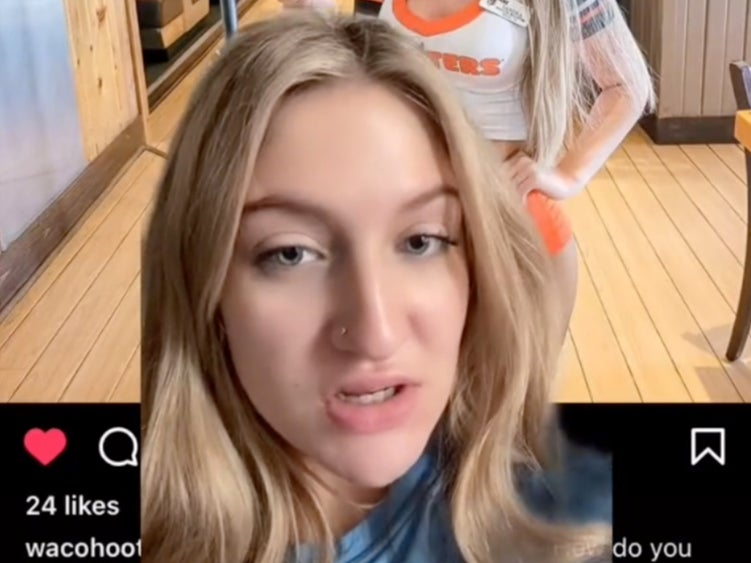 <p>A Hooters waitress accused the restaurant of editing her piercing </p>