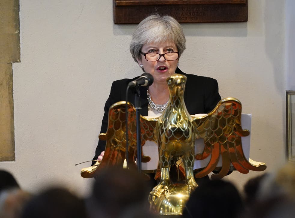 Former PM Theresa May speaks during the service