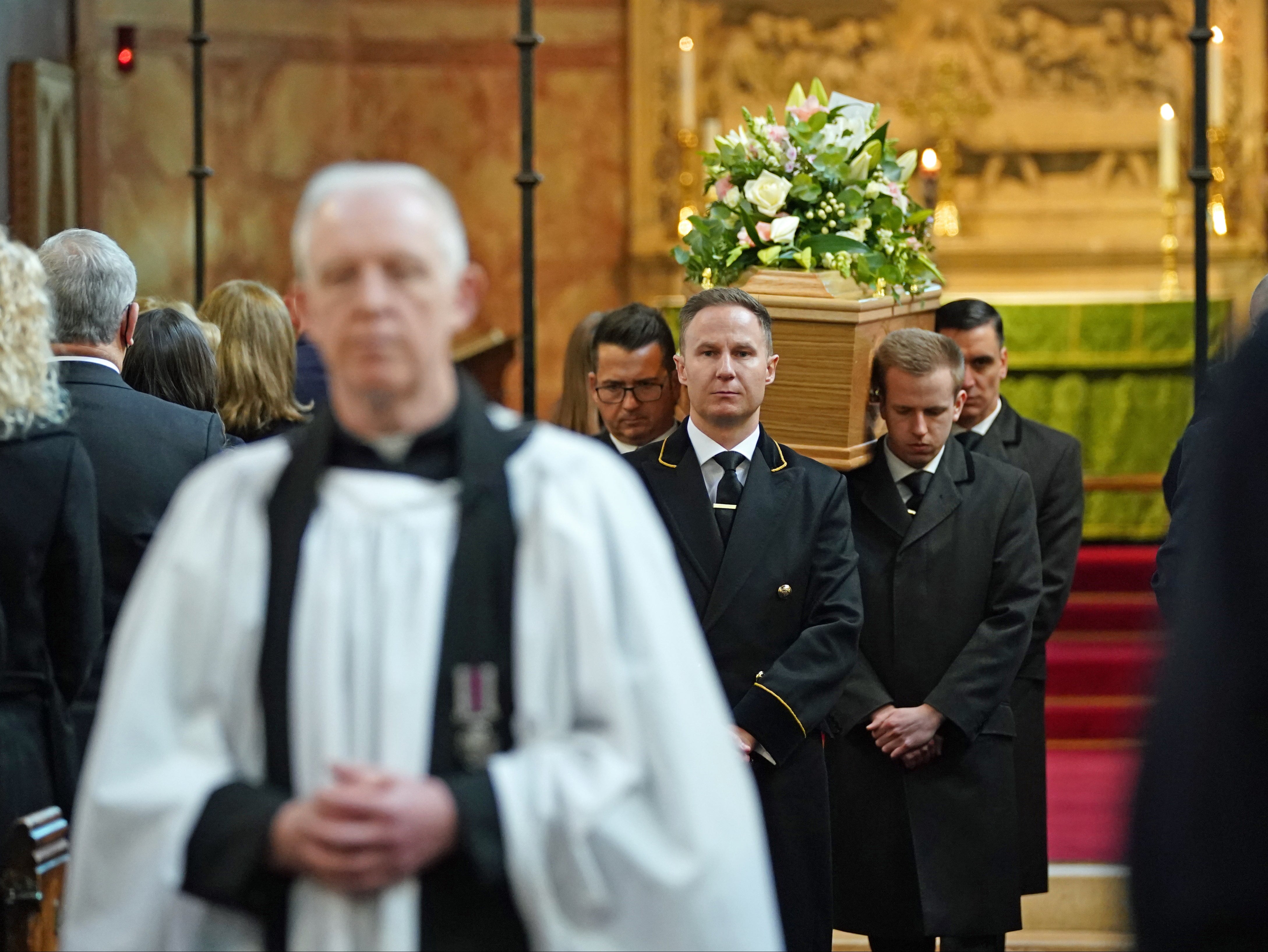 Brokenshire’s coffin is carried from the church
