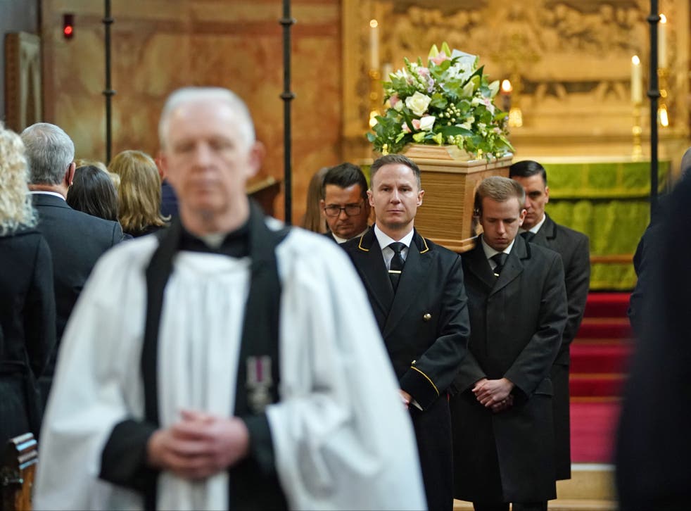 Brokenshire’s coffin is carried from the church
