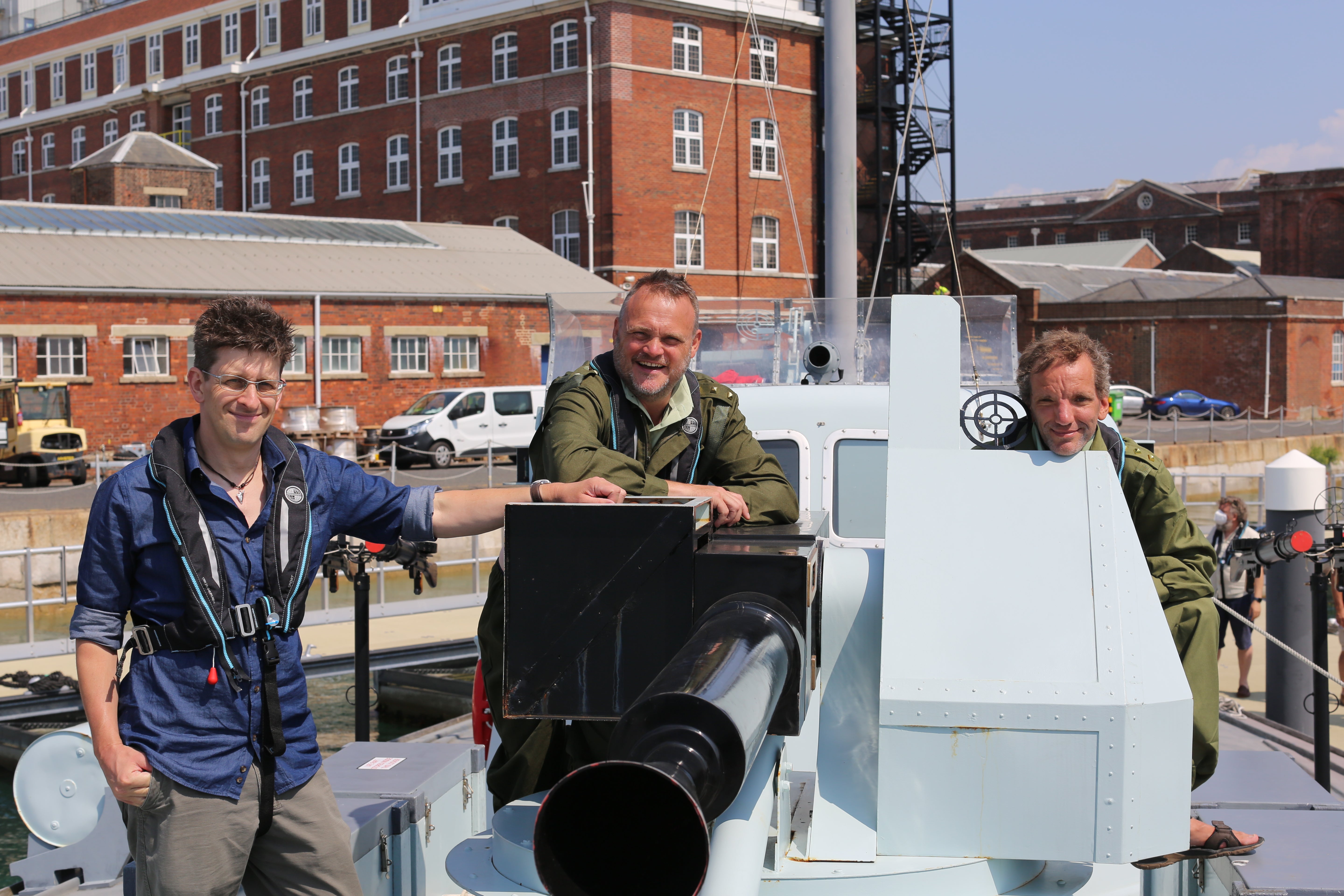 Murray, Wehn and historian Stephen Fisher on an MGB 81 in Portsmouth