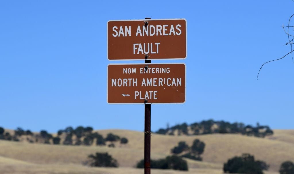 The San Andreas Fault is a tectonic boundary between the Pacific Plate, which is moving to the northwest at three inches each year and the North American Plate, heading south at about one inch per year
