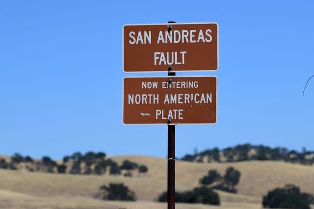 <p>The San Andreas Fault is a tectonic boundary between the Pacific Plate, which is moving to the northwest at three inches each year and the North American Plate, heading south at about one inch per year</p>