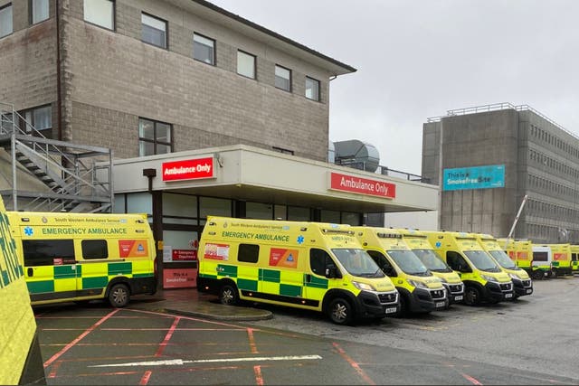 <p>Ambulances queueing to drop off patients at the A&E at Treliske hospital in Truro, Cornwall</p>