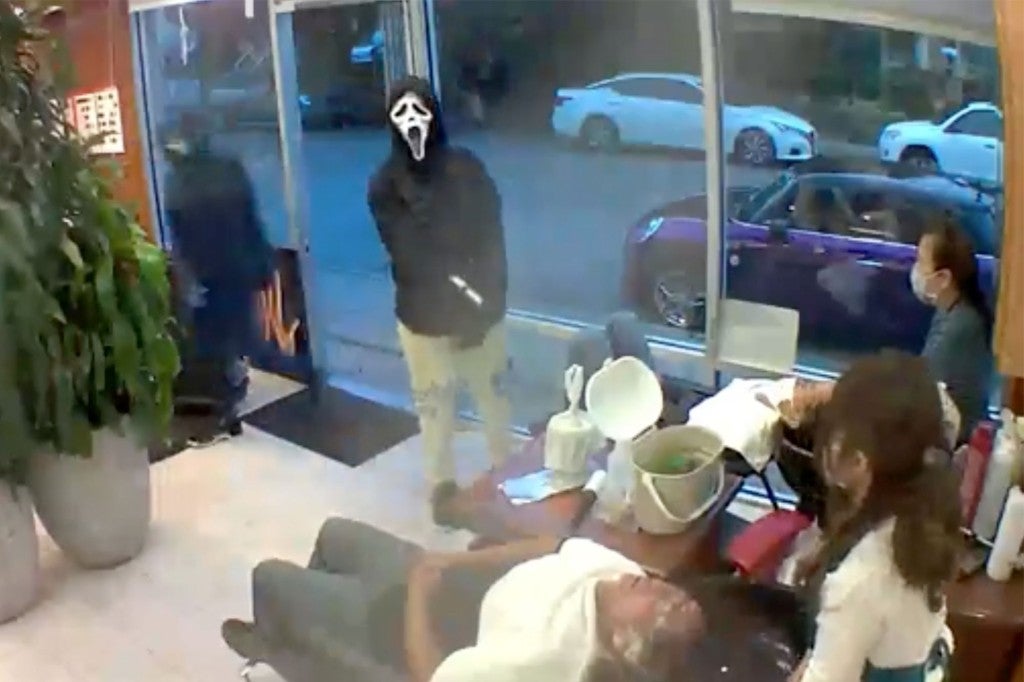 Four robbers reportedly stormed the salon