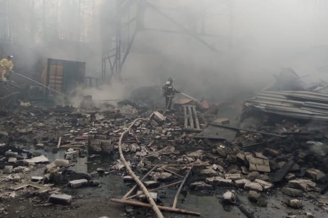 <p>Firefighters work to put out a fire at a gunpowder and chemicals plant in Ryazan Region on 22 October </p>