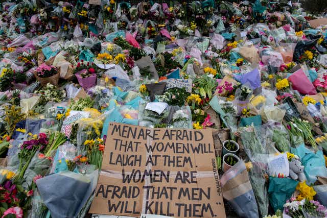 <p>Floral tributes left at Clapham Common bandstand for Sarah Everard </p>