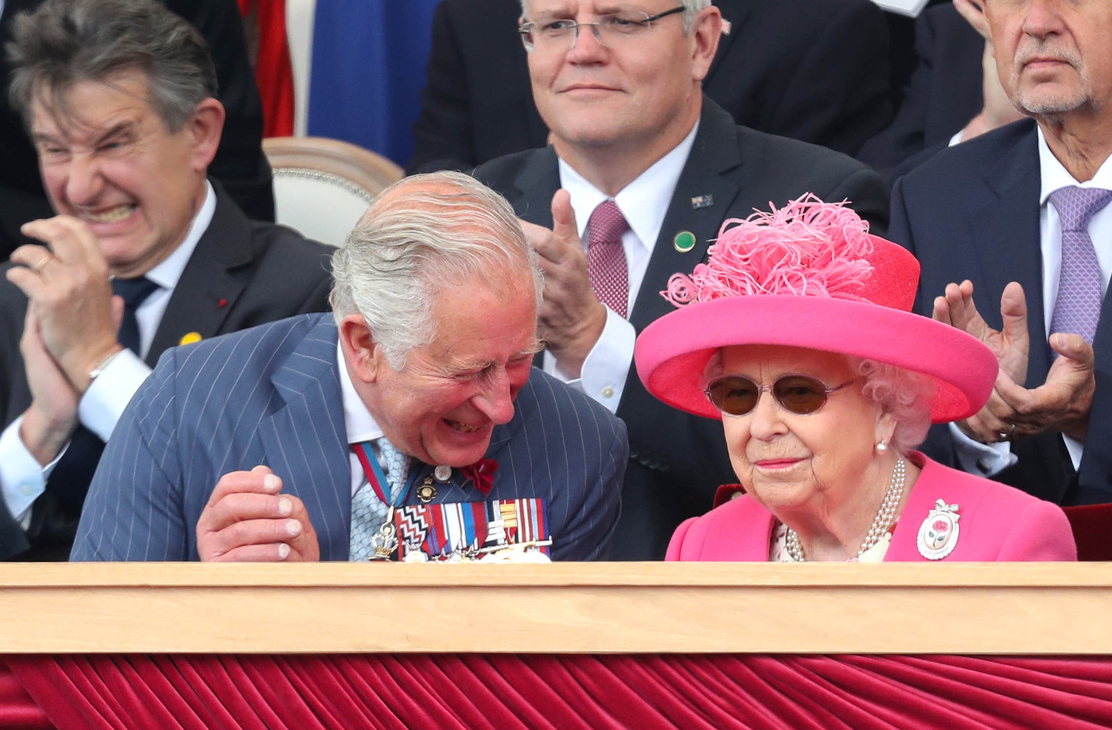 Prince Charles reacts as he sits with his mother during an event to commemorate the 75th anniversary of the D-Day landings, in Portsmouth in 2019