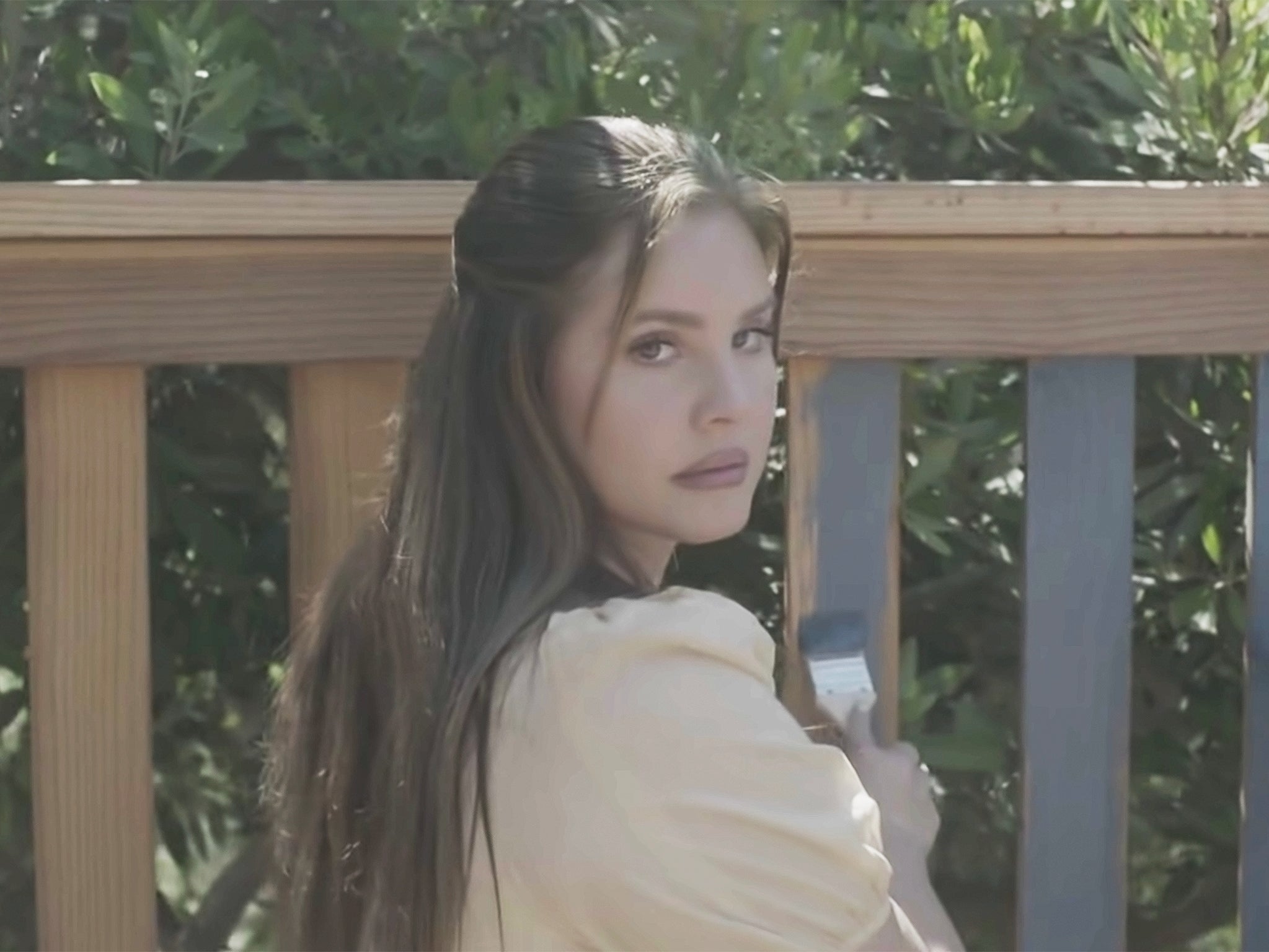Lana Del Rey in the visualisation for her single ‘Blue Banisters’