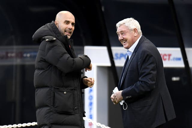 Pep Guardiola, left, said managers had to ignore the sort of criticism Steve Bruce faced at Newcastle (Peter Powell/PA)