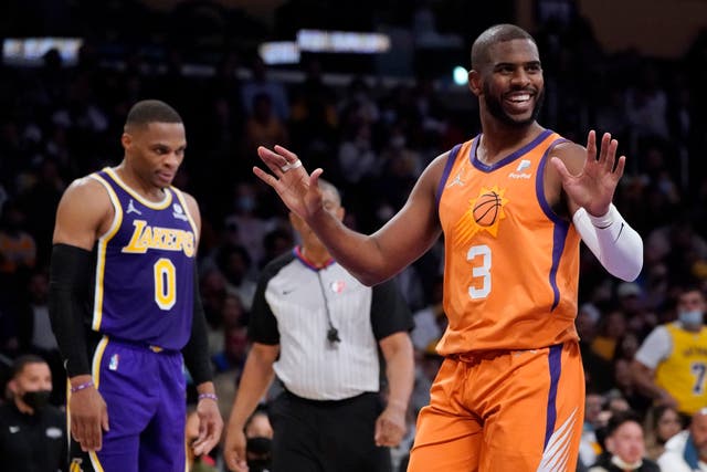 Phoenix Suns guard Chris Paul (3) argues a call during the first half of an NBA game against the Los Angeles Lakers (Marcio Jose Sanchez/AP)