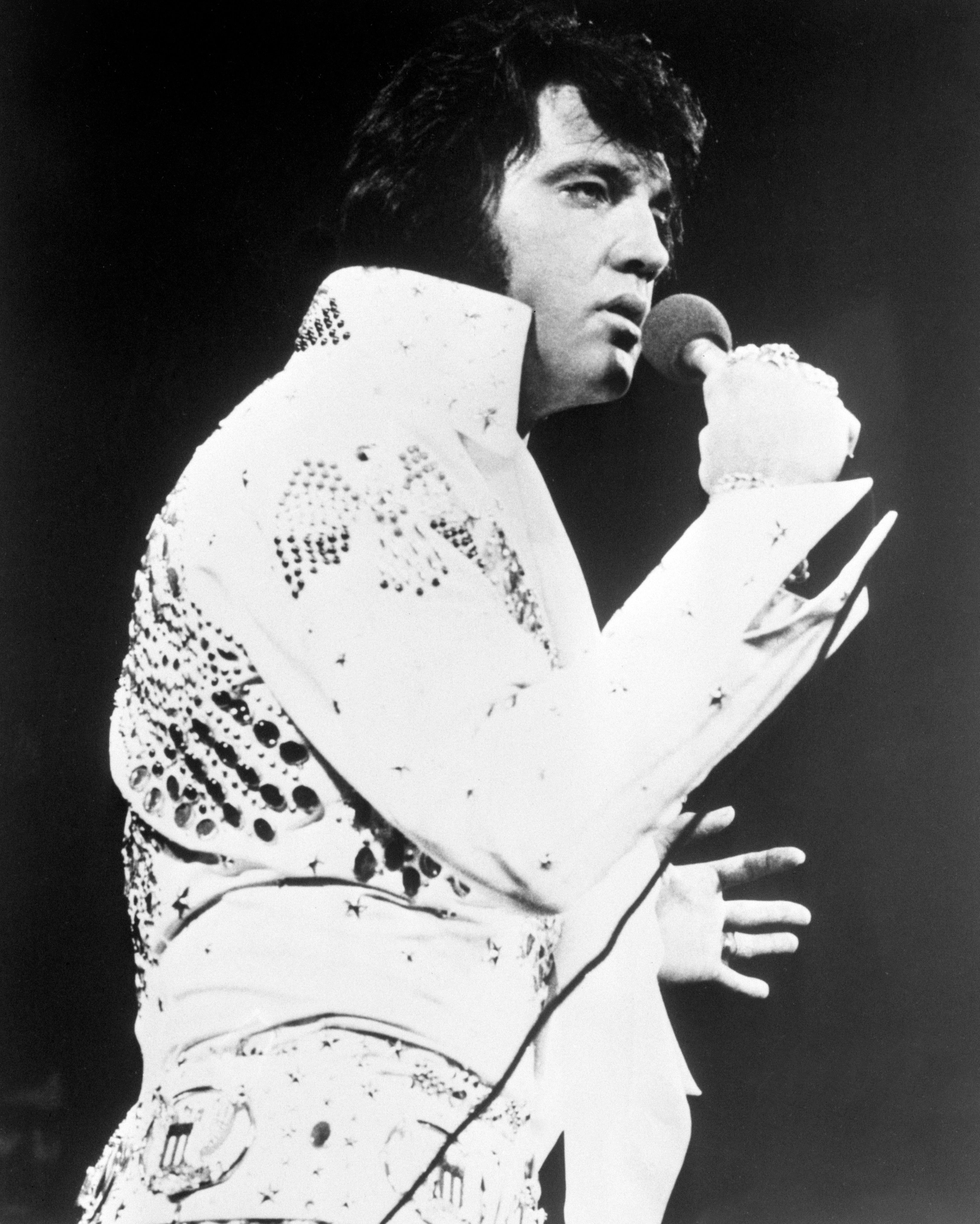 Elvis Presley wearing his iconic white jumpsuit (RCA Records/PA)