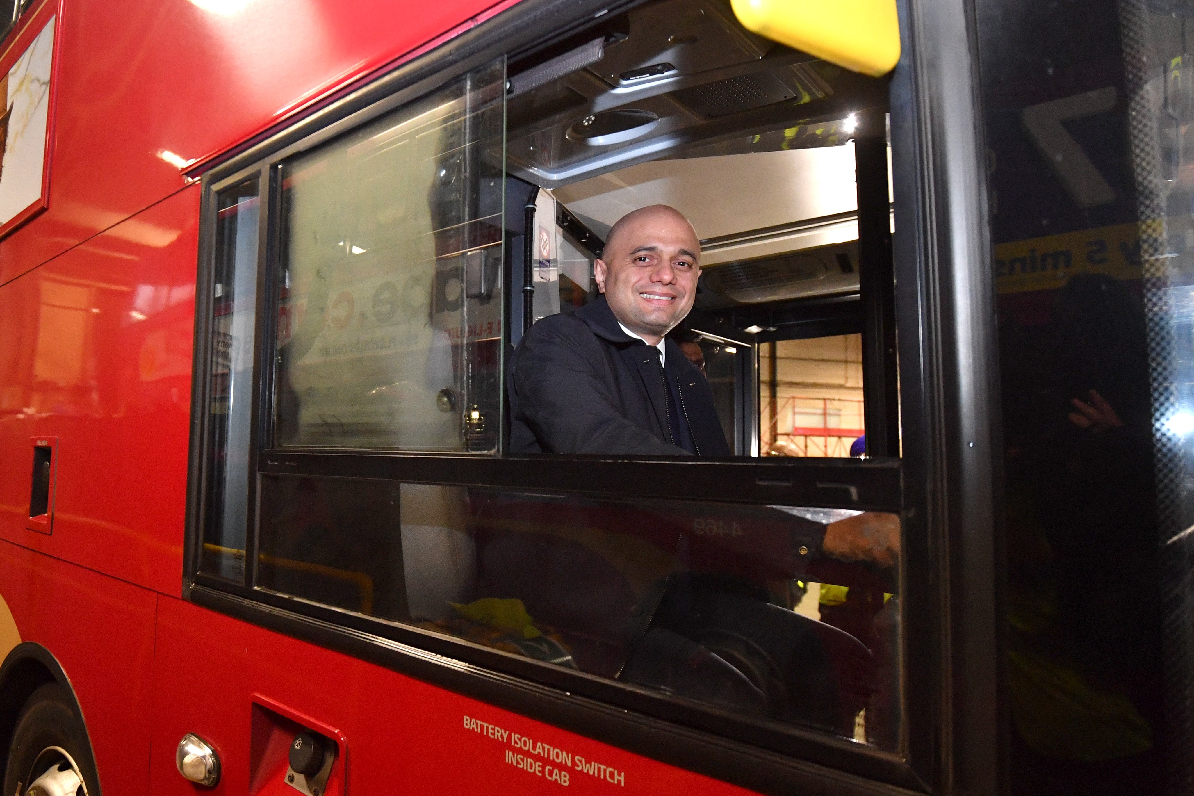 Like father like son: Javid at the wheel on a visit to Birmingham