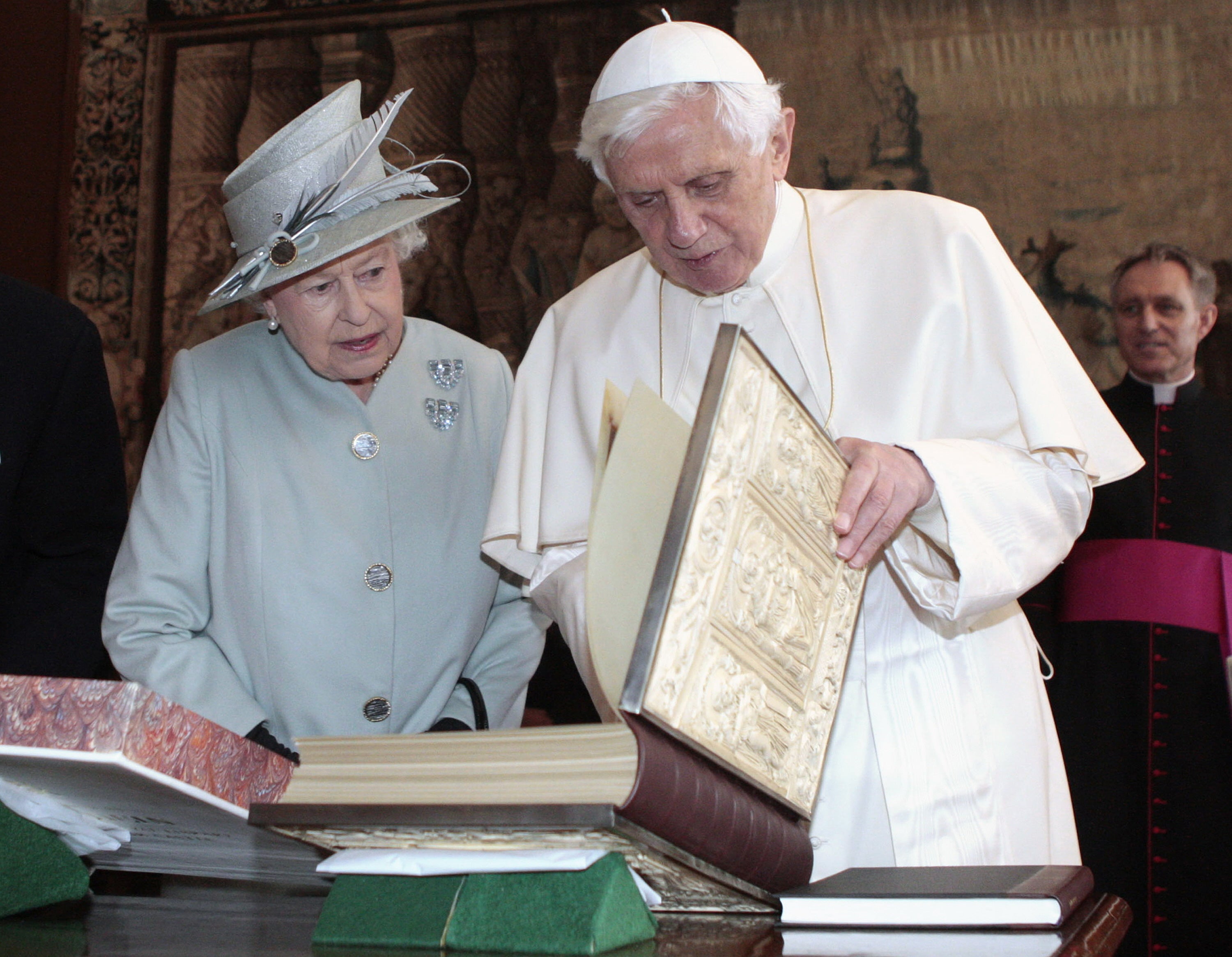 Queen Elizabeth II talking with Pope Benedict XVI during an audience in the Morning Drawing Room at the Palace of Holyroodhouse in Edinburgh during a four day visit by the Pope to the UK, 2010