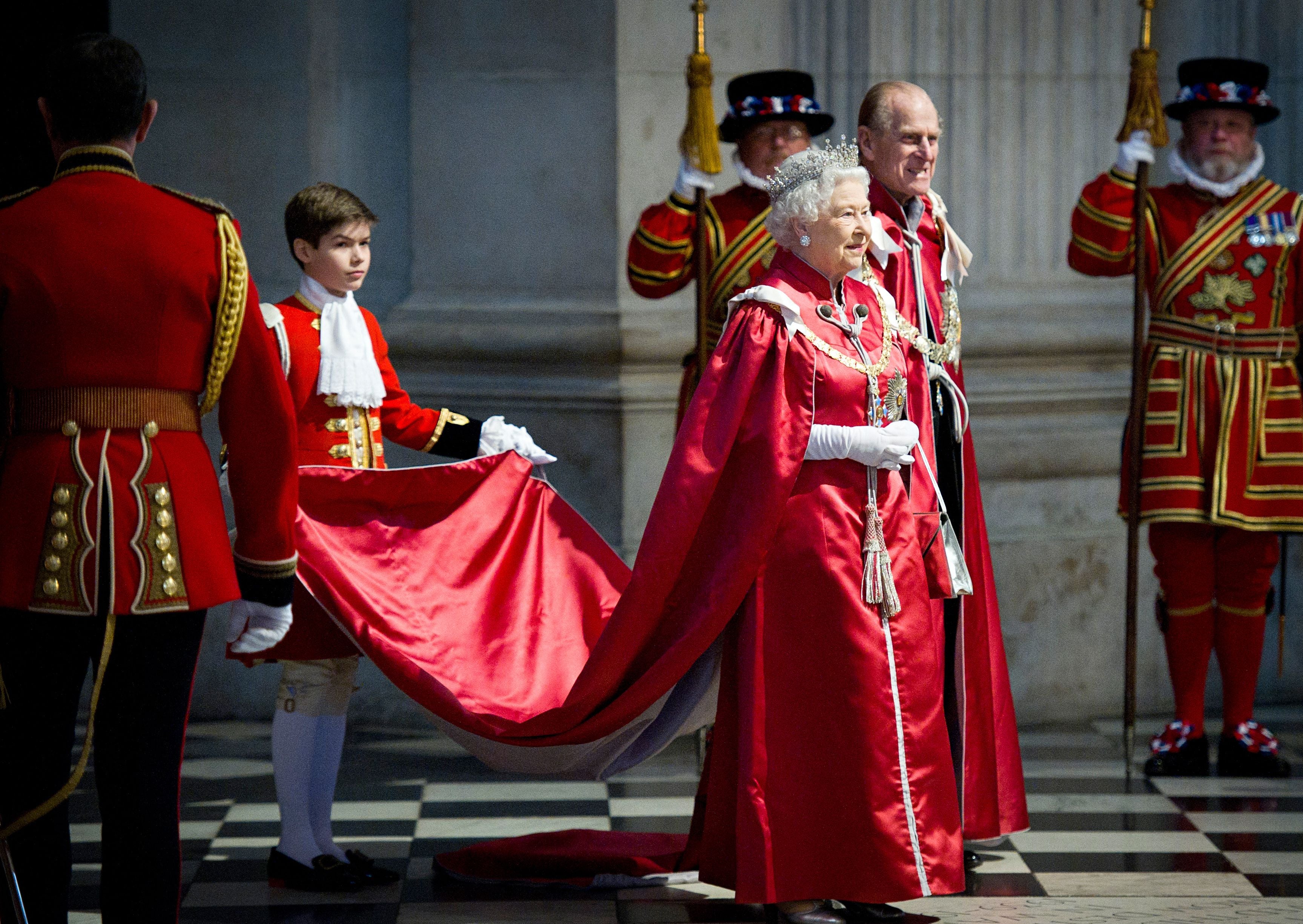 Queen Elizabeth II and Prince Philip attend a service for the Order of the British Empire at St Paul's Cathedral in London, 2012