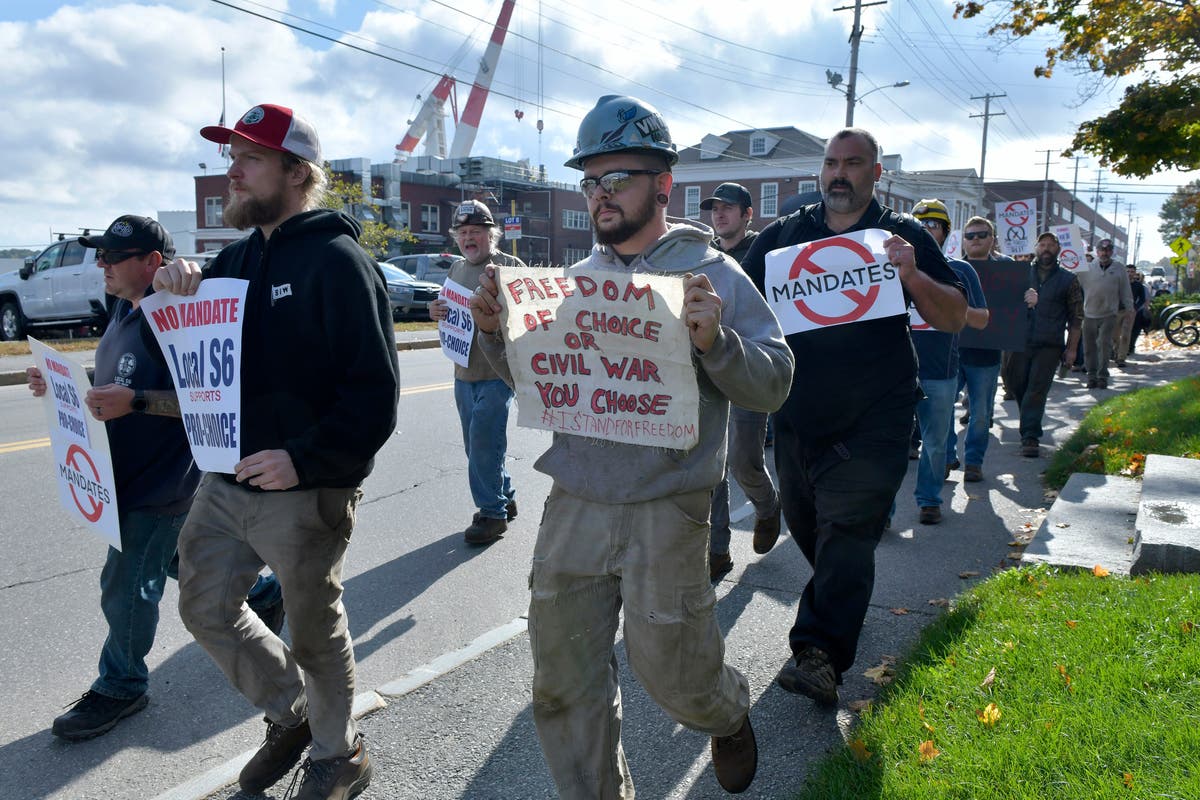 Vaccine mandates create conflict with defiant workers 