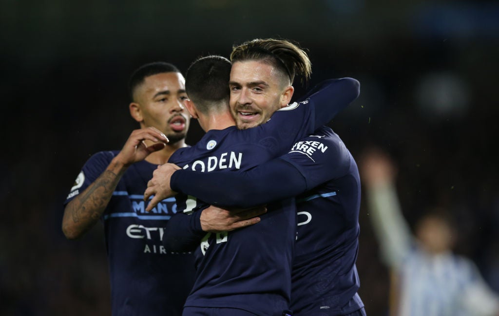 Foden is congratulated by midfield teammate Jack Grealish