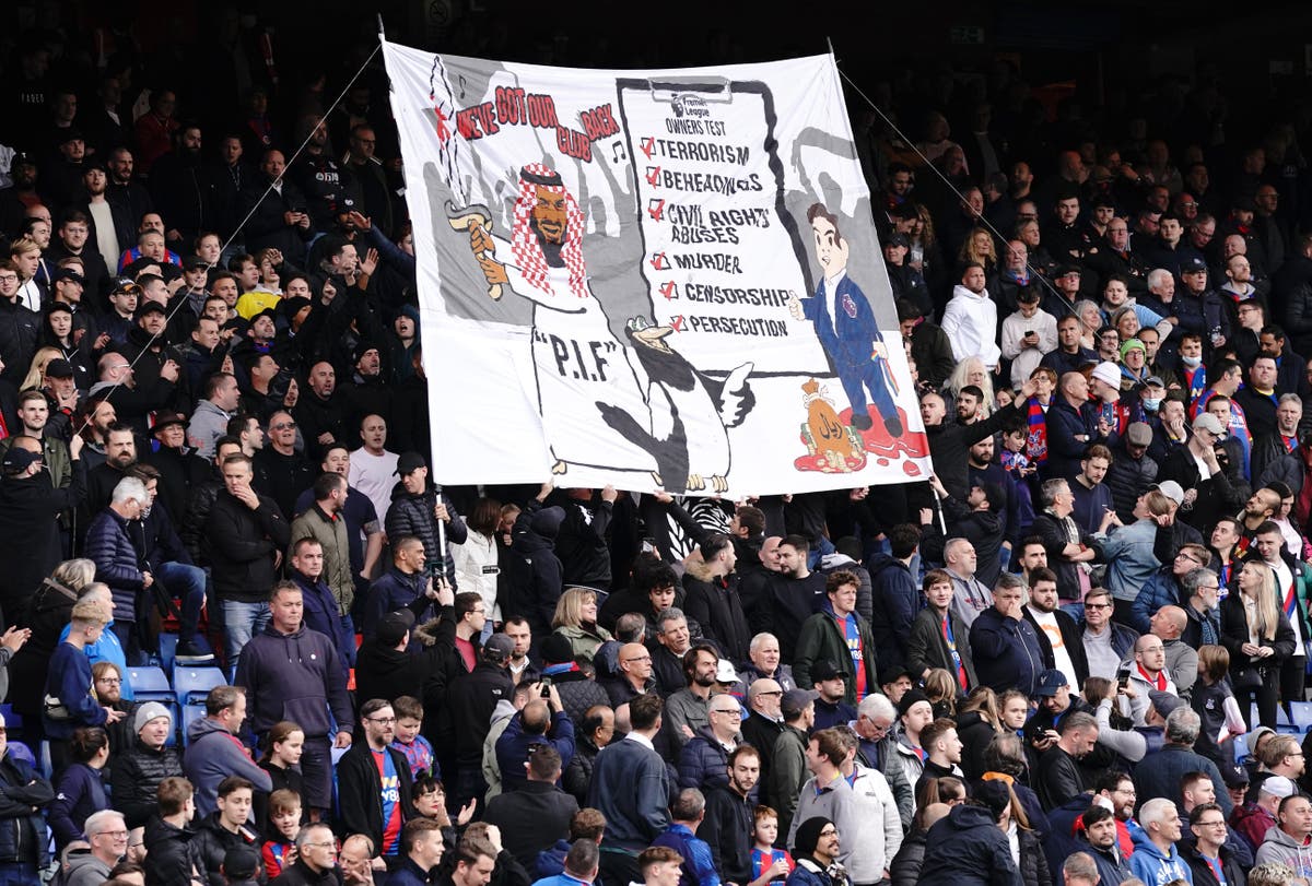 Police looking into Crystal Palace fans group banner in protest at Newcastle takeover Police looking into Crystal Palace fans group banner in protest at Newcastle takeover