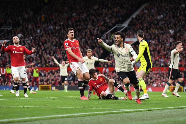 <p>Mohamed Salah celebrates scoring Liverpool’s third</p>